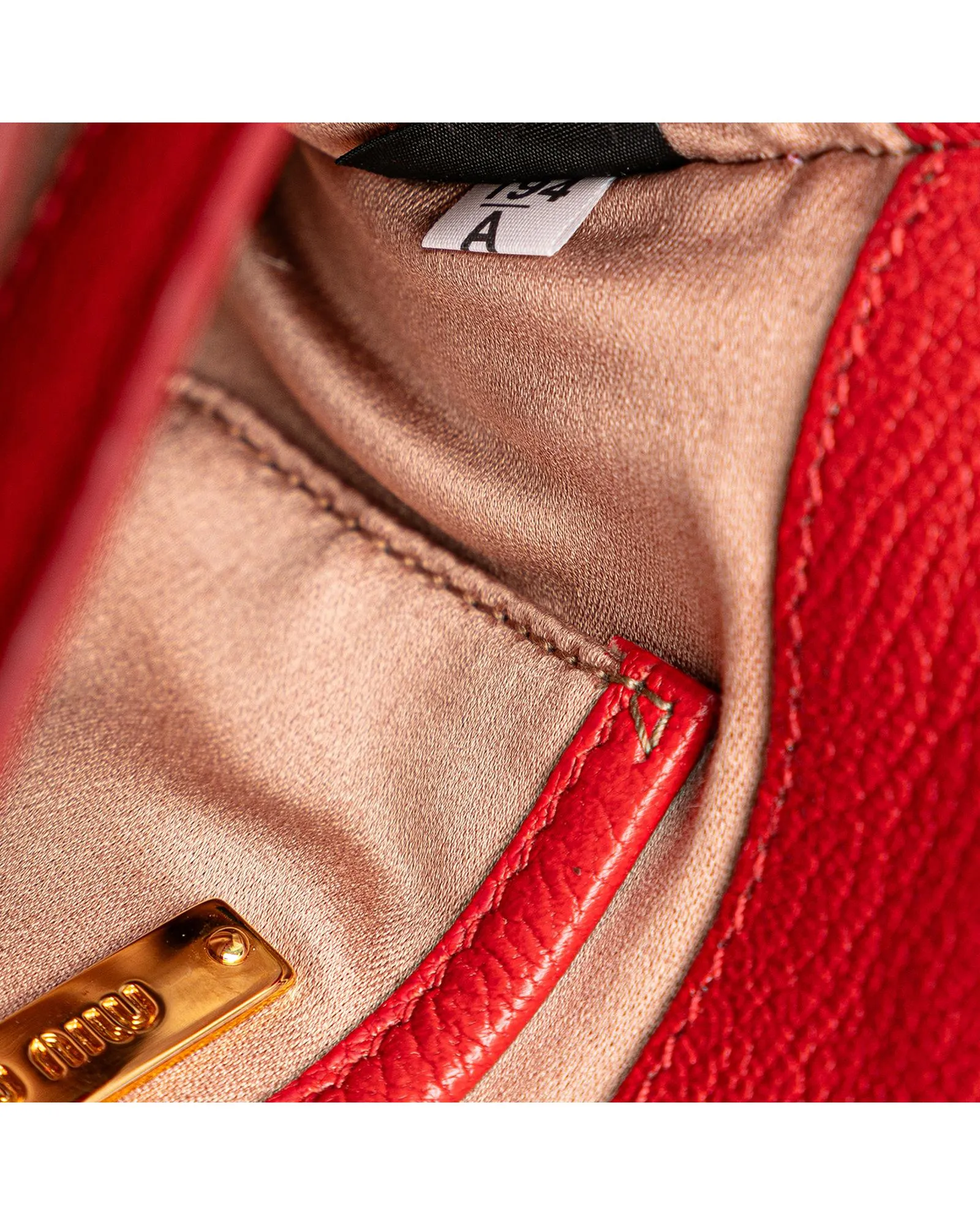 Studded Leather Crossbody Bag with Magnetic Snap Closure